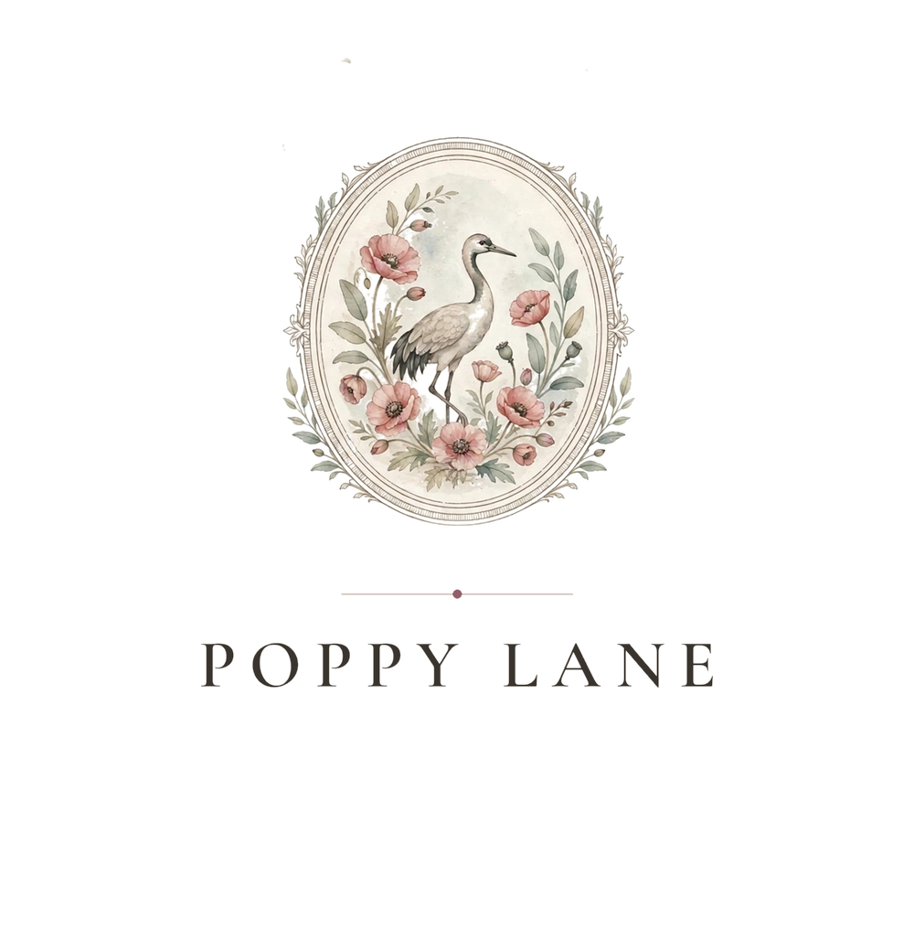 Poppy Lane emblem, a crane standing among poppies inside an oval frame, with the words Poppy Lane beneath